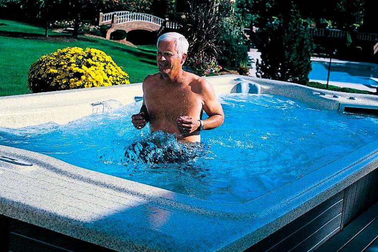 Older man jogging in Swim Spa